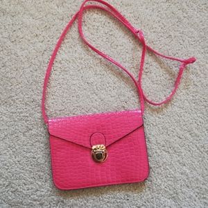 Small over the shoulder textured pink purse